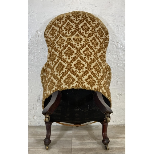 24 - A Victorian mahogany and floral fabric upholstered parlour chair - approx. 105cm high x 77cm wide x ... 