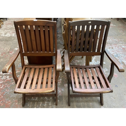 44 - A pair of Bramblecrest teak folding garden armchairs