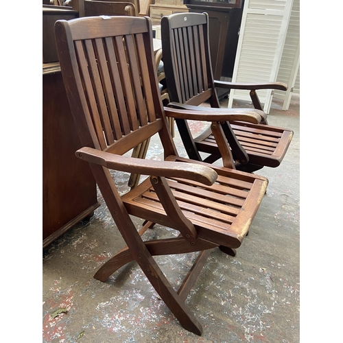 44 - A pair of Bramblecrest teak folding garden armchairs