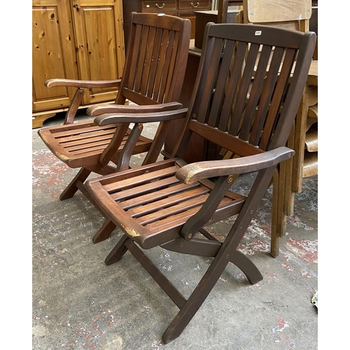 44 - A pair of Bramblecrest teak folding garden armchairs