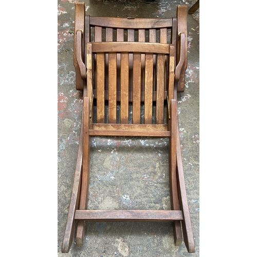 44 - A pair of Bramblecrest teak folding garden armchairs