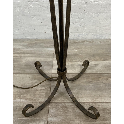 53 - A modern wrought metal standard lamp - approx. 153cm high