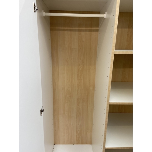 66 - A modern white laminate and beech effect double wardrobe - approx. 166cm high x 100cm wide x 50cm de... 