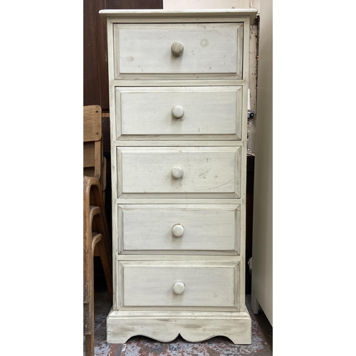 68 - A white painted pine chest of drawers - approx. 127cm high x 57cm wide x 46cm deep