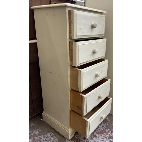 68 - A white painted pine chest of drawers - approx. 127cm high x 57cm wide x 46cm deep