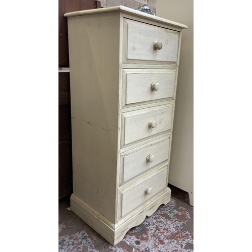 68 - A white painted pine chest of drawers - approx. 127cm high x 57cm wide x 46cm deep