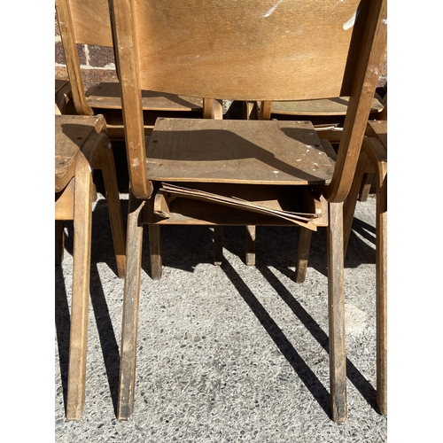 69 - Seven mid 20th century bentwood and plywood stacking chairs