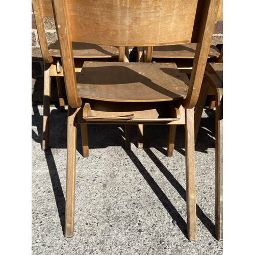 69 - Seven mid 20th century bentwood and plywood stacking chairs