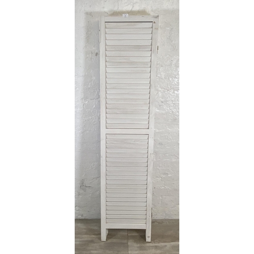 70 - A white painted wooden six section folding screen - approx. 170cm high x 240cm wide