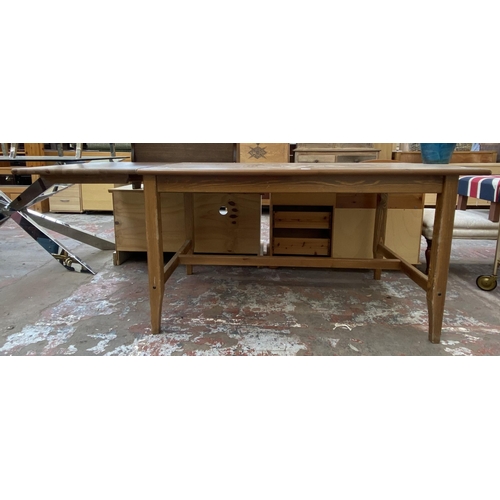 76 - A pine rectangular dining table - approx. 75cm high x 79cm wide x 140cm deep