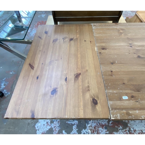 76 - A pine rectangular dining table - approx. 75cm high x 79cm wide x 140cm deep