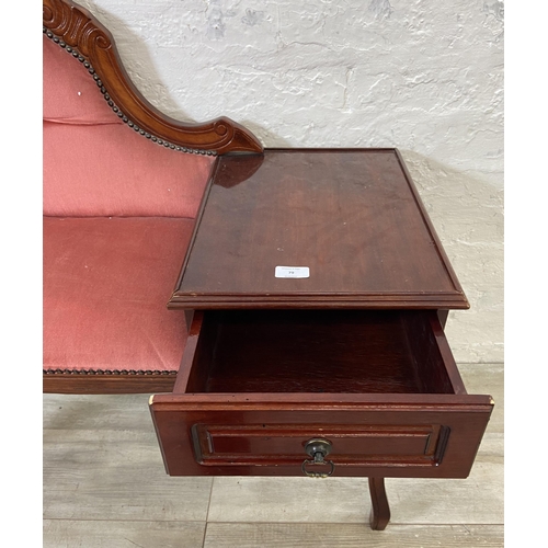 79 - A 19th century style mahogany and pink fabric upholstered telephone table