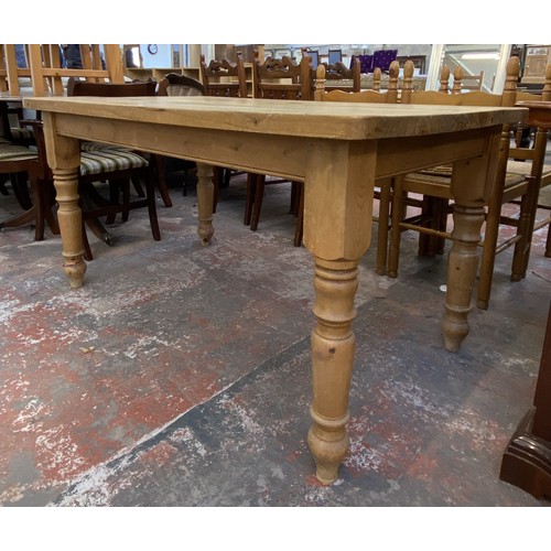 180A - A Victorian style pine farmhouse dining table - approx. 78cm high x 89cm wide x 152cm long