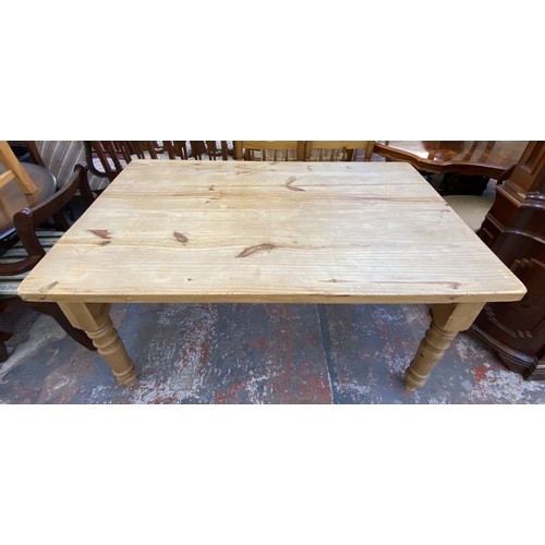 180A - A Victorian style pine farmhouse dining table - approx. 78cm high x 89cm wide x 152cm long