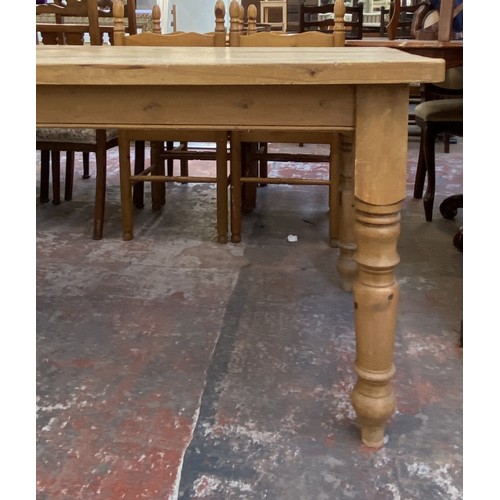 180A - A Victorian style pine farmhouse dining table - approx. 78cm high x 89cm wide x 152cm long