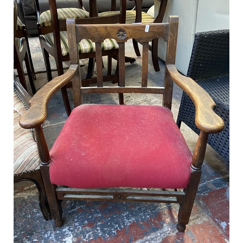 174 - Six chairs, one Victorian style spoon back nursing chair, one oak framed carver chair and a set of f... 