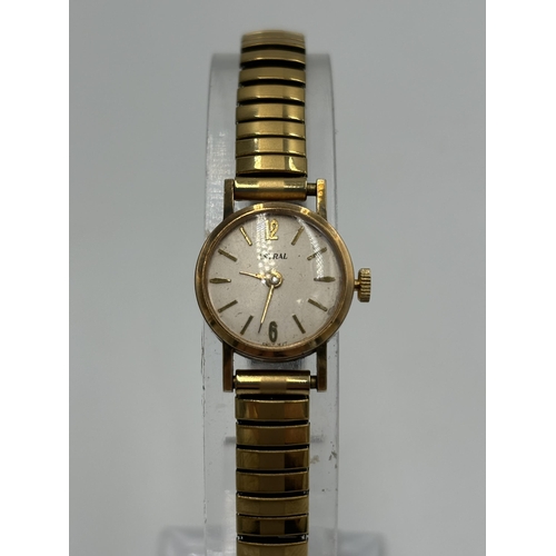 2184 - A vintage Astral 9ct gold cased hand wind lady's wristwatch with stainless steel and gold plated bra... 