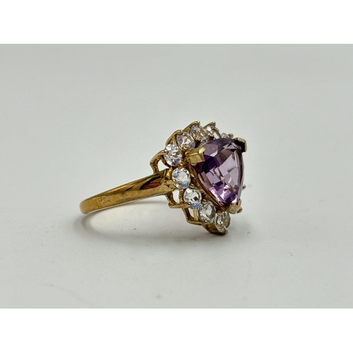 2154C - A hallmarked Birmingham 9ct gold amethyst and clear gemstone cluster ring, size P - approx. gross we... 