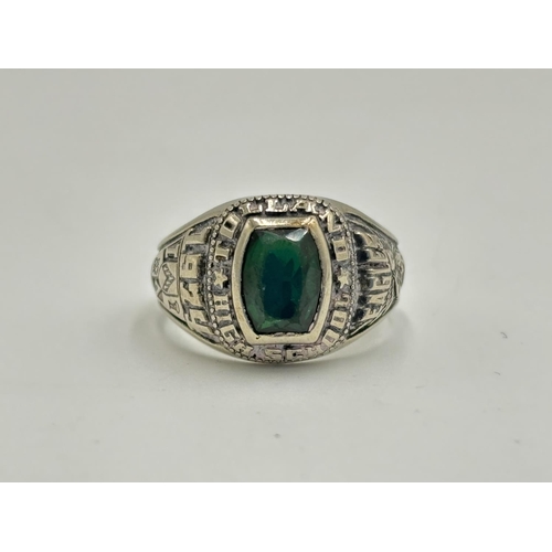 2130 - A Herff Jones 10k white gold green gemstone set American high school graduation class signet ring, s... 