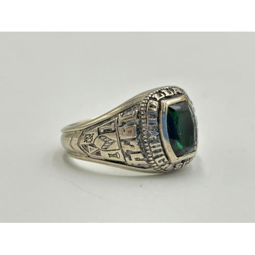 2130 - A Herff Jones 10k white gold green gemstone set American high school graduation class signet ring, s... 