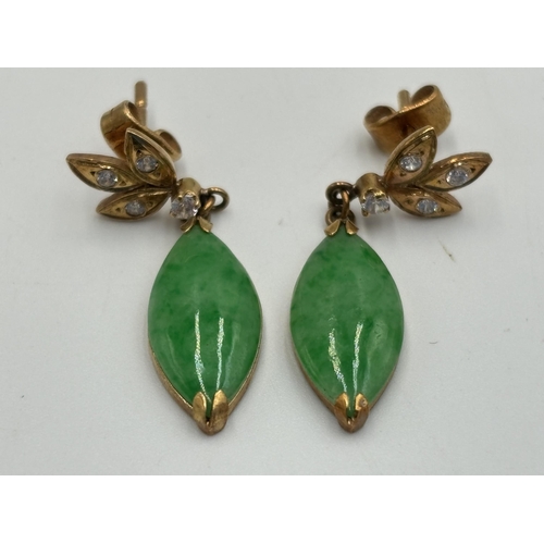 2134 - A pair of yellow metal jade and clear stone set drop earrings - approx. gross weight 3.1g