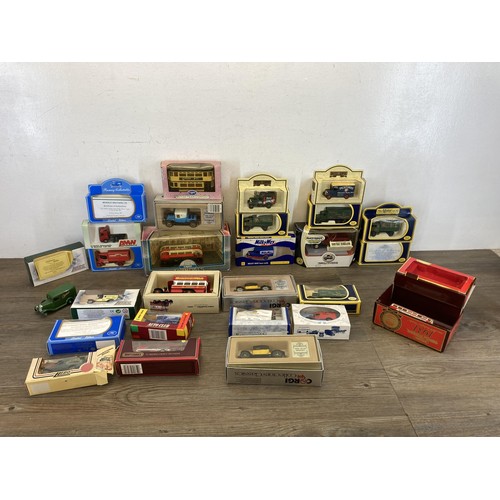 496 - A collection of boxed diecast model vehicles to include Corgi Tramlines, Corgi Collectors' Classics,... 