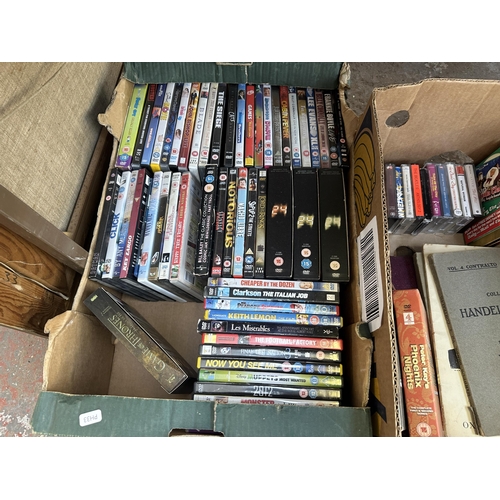 1113 - Three boxes containing DVDs, sheet music and various music magazines to include Planet Rock, Classic... 