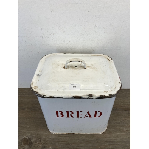 401 - A mid 20th century white and red enamel two handled bread bin - approx. 29cm high x 36cm wide