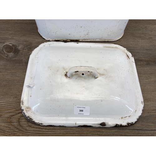 401 - A mid 20th century white and red enamel two handled bread bin - approx. 29cm high x 36cm wide