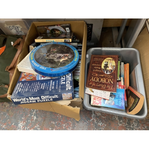 1130 - A large quantity of house clearance items to include books, Halfords cool box, ceramics, glassware e... 