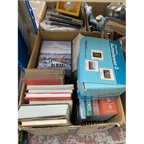 1130 - A large quantity of house clearance items to include books, Halfords cool box, ceramics, glassware e... 