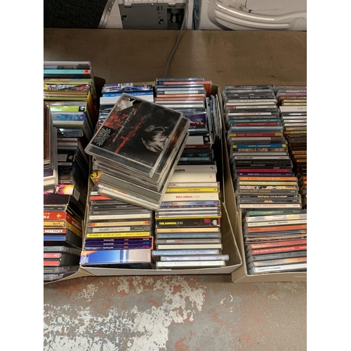 1159 - Four boxes of CDs to include Usher, Anastacia, Barbra Streisand etc.