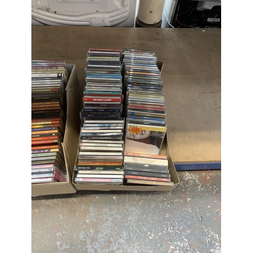 1159 - Four boxes of CDs to include Usher, Anastacia, Barbra Streisand etc.