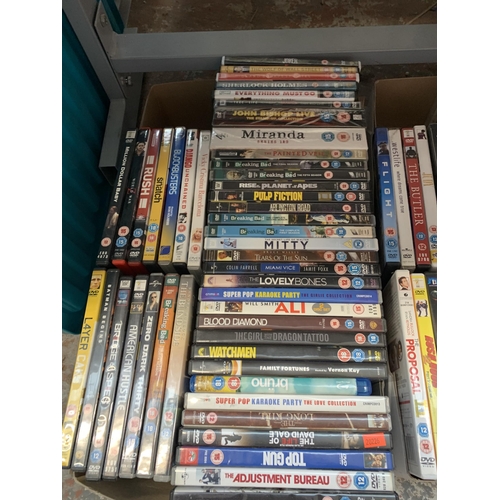 1160 - Two boxes of DVDs to include Bruno, Snatch, Flight etc.