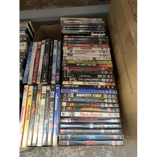 1160 - Two boxes of DVDs to include Bruno, Snatch, Flight etc.