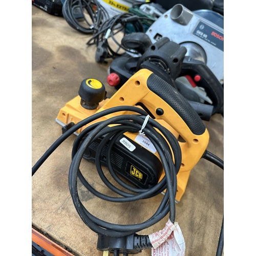 1044 - Three power tools, one Bosch GKS 65 circular saw, one Draper 810w belt sander and one JCB planer