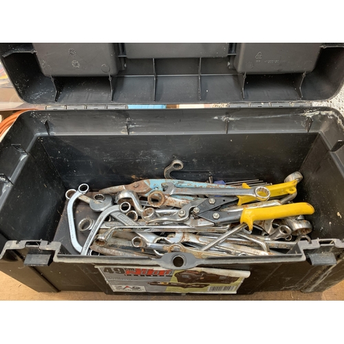 1056 - Two Zag 2000 series 49cm black plastic tool boxes with contents to include spanners, socket sets, sc... 