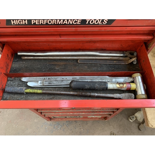 1067 - A Snap-On red metal rolling tool chest with contents and keys - approx. 135cm high x 67cm wide x 46c... 