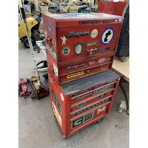 1067 - A Snap-On red metal rolling tool chest with contents and keys - approx. 135cm high x 67cm wide x 46c... 