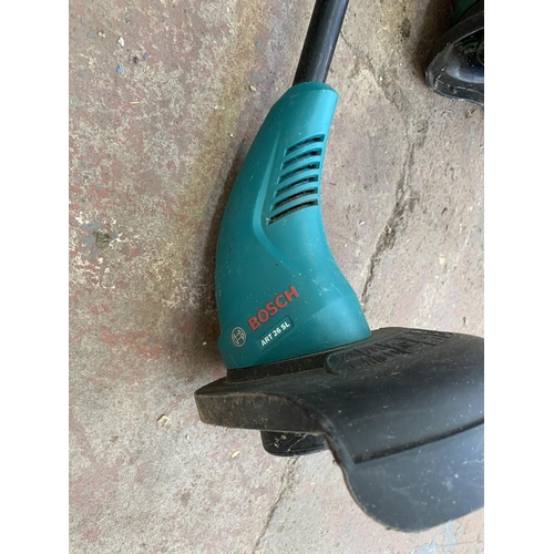 1089 - Three electric garden tools, one Bosch Rotak 370ER lawn mower, one Bosch ART26SL strimmer and one ot... 