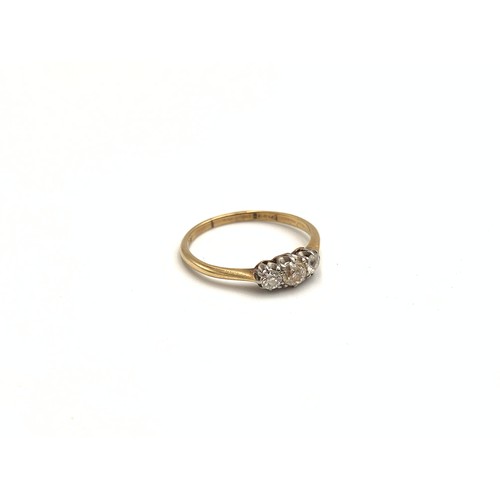 2148 - An 18ct gold diamond trilogy ring, size L - approx. gross weight 1.4g