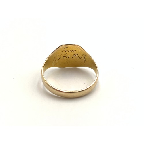 2149 - A yellow metal signet ring, size R - approx. gross weight 2.7g