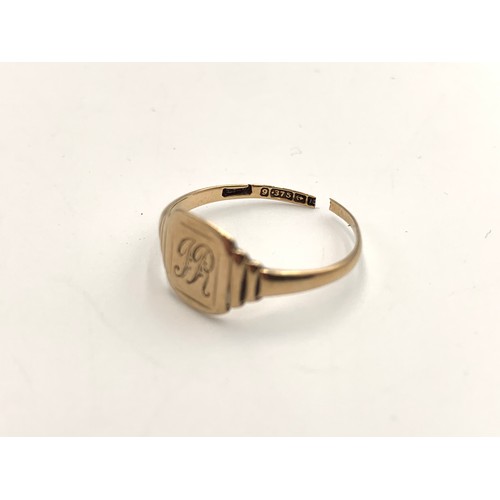 2150 - A hallmarked Birmingham 9ct gold signet ring - approx. gross weight 1.1g