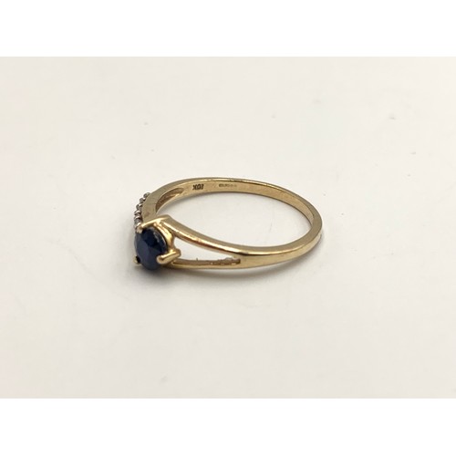 2151 - A TGGC hallmarked 9ct gold sapphire and CZ ring, size O - approx. gross weight 1.45g