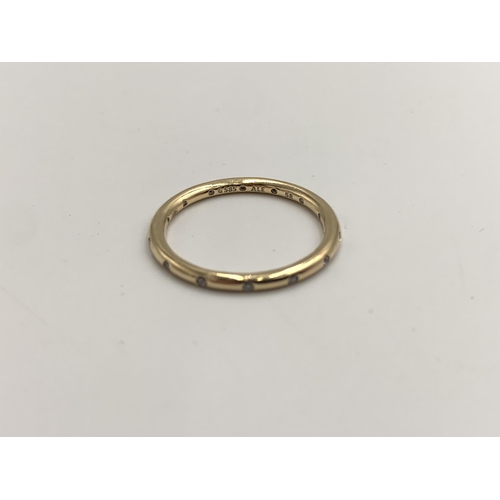 2120 - A Pandora 14ct gold CZ eternity ring, size R - approx. gross weight 2.32g