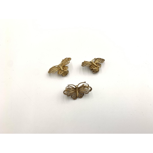 2147 - A collection of jewellery to include pair of .925 gilt silver filigree butterfly clip on earrings an... 