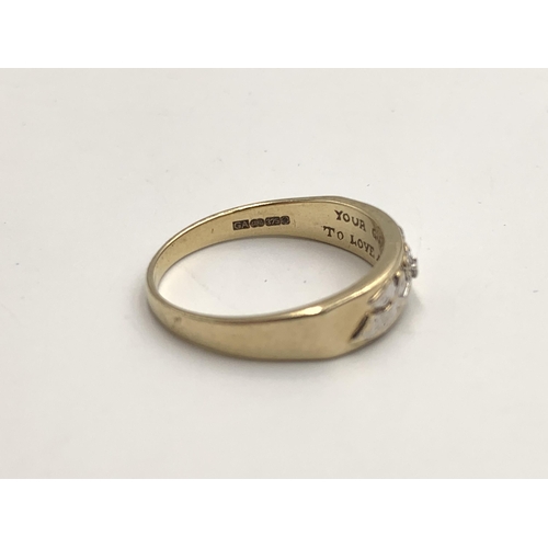 2156 - A hallmarked 9ct gold diamond set guardian angel ring with inscription, size T - approx. gross weigh... 