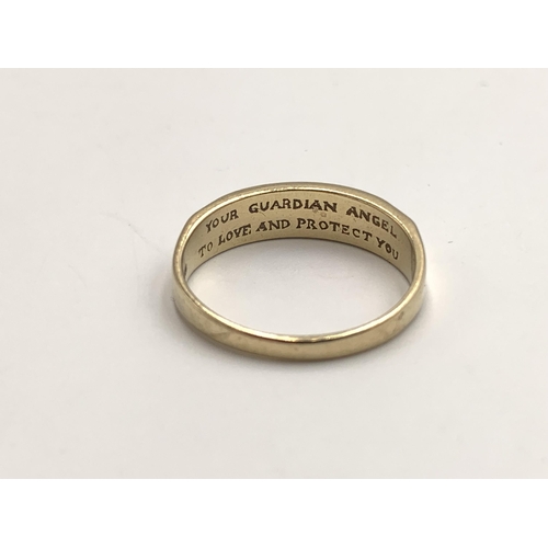 2156 - A hallmarked 9ct gold diamond set guardian angel ring with inscription, size T - approx. gross weigh... 