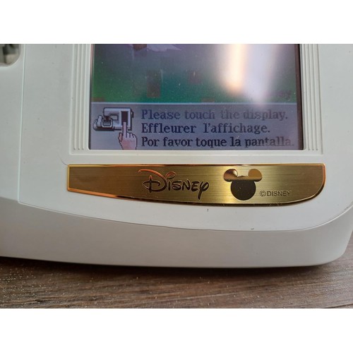 786 - A cased Brother Innov-is 4000D Disney Edition computerised sewing and embroidery machine with foot p... 