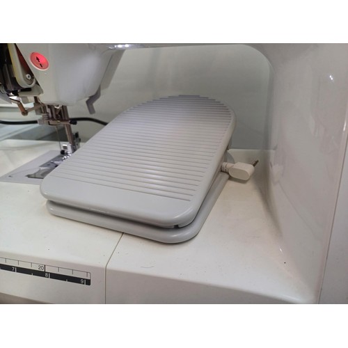 786 - A cased Brother Innov-is 4000D Disney Edition computerised sewing and embroidery machine with foot p... 